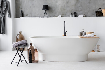 Interior of modern bathroom with decorative bottles