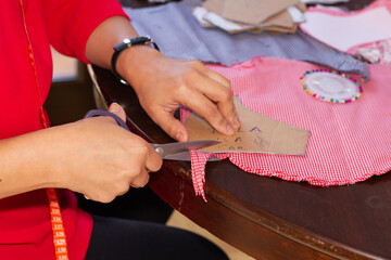 Manufacture of washable cloth masks for facial protection against covid-19 virus, coronavirus, global pandemic and allergy, selective focus