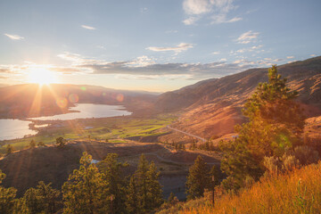A sunset view of the Okanagan vineyards and orchards in Osoyoos, B.C. Canada, which is renowned wine country in the Okanagan Valley.