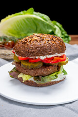 Grilled plant based, meat free vega burgers close up