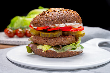 Grilled plant based, meat free vega burgers close up