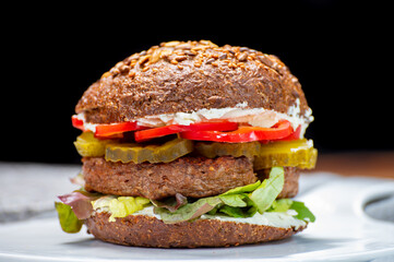 Grilled plant based, meat free vega burgers close up