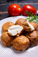 Tasty Italian food, small balls of smoked mozzarella soft cheese