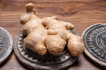 Fresh ginger rhizome root used in traditional medicines and for flavoring meals worldwide.