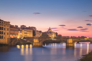Fototapeta na wymiar A sunset view of Florence, Tuscany, Italy and the River Arno on clear summer evening.