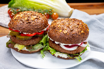 Grilled plant based, meat free vega burgers close up