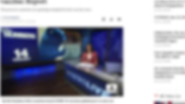 Browsing of most popular internet media newspapers on the topic of coronavirus and vaccination. Internet surfing timelapse, 24 seconds blurred version