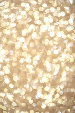 Bright round light bokeh vivid champagne color background