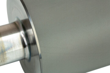 Closeup shot of an anilox roller also called a raster cylinder or ceramic coated roller, isolated...