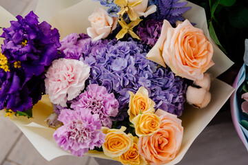 bright delicate multi-colored bouquet. Flowers are a traditional beautiful gift