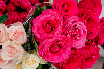bright roses in a bouquet. Flowers are a traditional beautiful gift