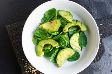 avocado salad vegetable fried grilled lettuce spinach arugula snack barbecue ready to eat on the table healthy meal top view copy space text food background rustic image 