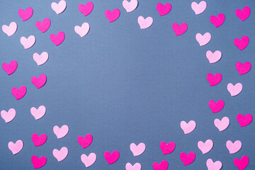 Obraz na płótnie Canvas Elements in shape of hearts on dark blue background. Symbols of love for Happy Women's, Mother's, Valentine's Day, birthday greeting card design.