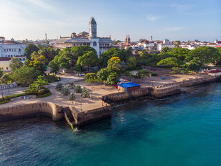 Zanzibar Aerial Shot of Stone Town Embarkment with Traditional Dhow Fisherman Boats in the Ocean at...