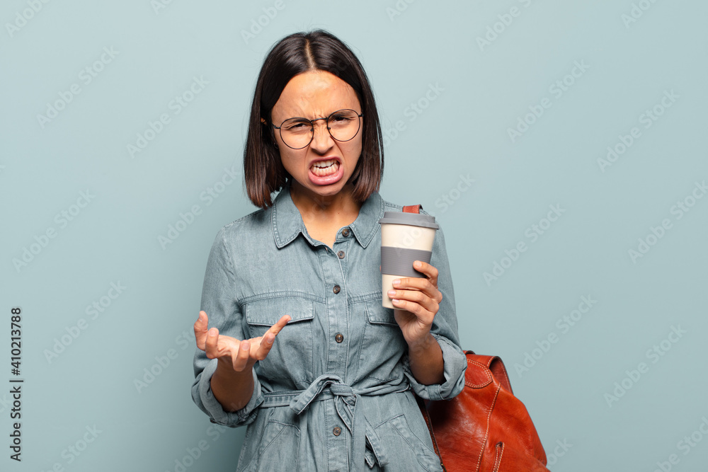 Canvas Prints young hispanic woman looking angry, annoyed and frustrated screaming wtf or what’s wrong with you