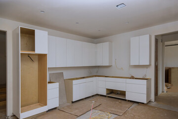 White of kitchen wooden cabinets with contemporary