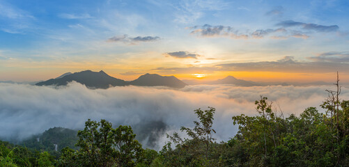 The beautiful view of the sunrise against the sea of mist at Phu Tok, Loei, Thailand.