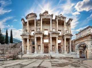 Facade of antique library of Celsus in Ephesus under bright sun