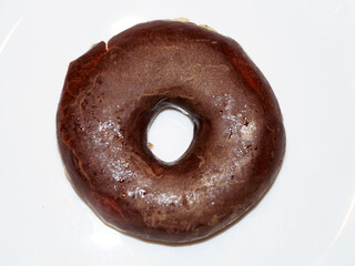 chocolate donut on a white background close-up