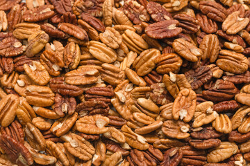 Tasty pecan-nut background. Top view.