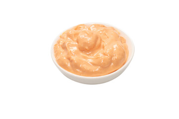 Sauce in a bowl isolated on white.
