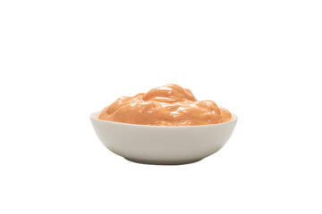 Sauce in a bowl isolated on white.