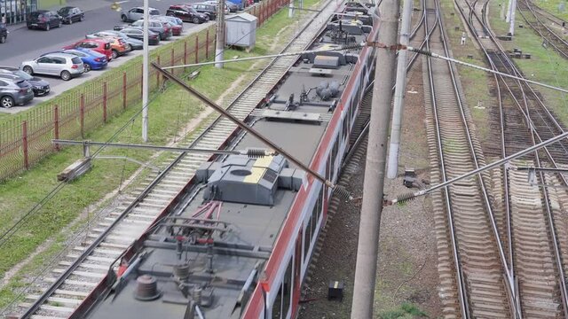 Modern passenger train racing speed from rail station top view. Transportation concept.
