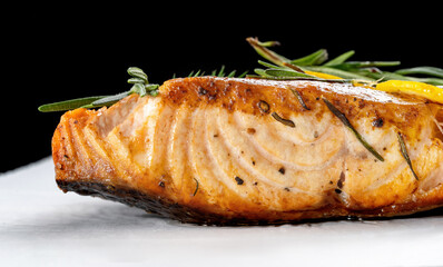 Salmon with lemon steak, decorated with rosemary.
