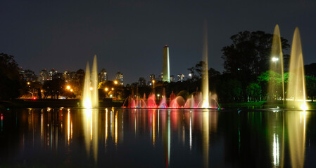 Fototapeta na wymiar Ibirapuera park fountains and lake at night, Sao Paulo city, Brazil