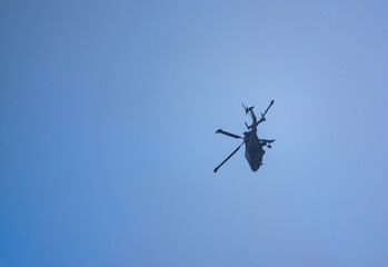 Wildcat MK1 UK Army banking overhead in a cloudy blue sky