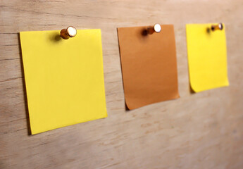 pieces of paper to write on a wooden board