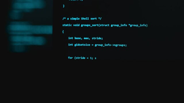 Modern tech. Program development and blockchain concept. Developer working on program codes in office. Shallow depth of field bokeh, selective focus effect. Hacking or protection data