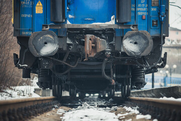 Truskavets, Ukraine - January 2021: Freight train awaiting departure on the platform of the railway...
