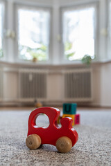Large room with baby toys on floor