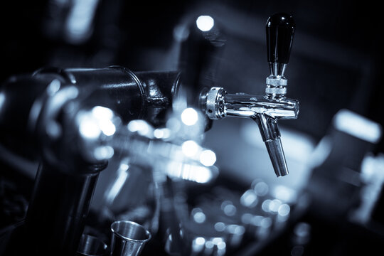 Close up shot of a beer tap in a bar.