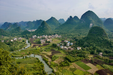 Sunset landscape of Guilin, Li River and Karst mountains. Located near Yangshuo County, Guilin City, Guangxi Province, China.