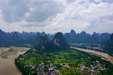 Sunset landscape of Guilin, Li River and Karst mountains. Located near Yangshuo County, Guilin City, Guangxi Province, China.