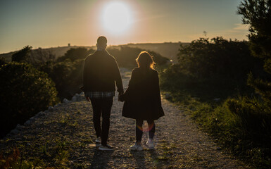 couple walking in the sunset, Victoria lines