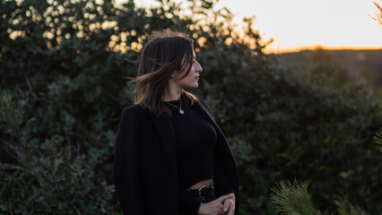 woman in the forest during sunset