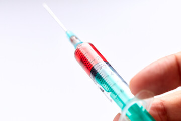  Vaccine in vial with syringe