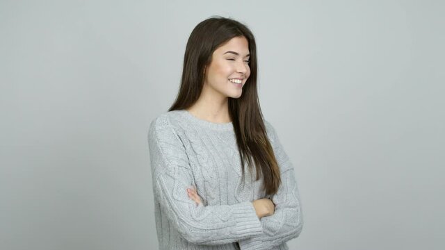 Teenager Brazilian girl keeping the arms crossed in confident expression over isolated background