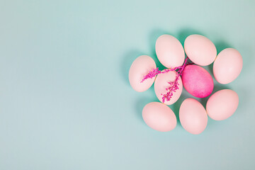Easter. White eggs with red, on a uniform blue background.