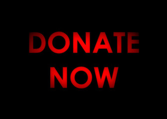 A red message with shadows on a black background: Donate now.
