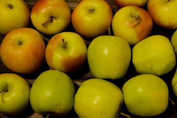 background set of green apples on the table fruit