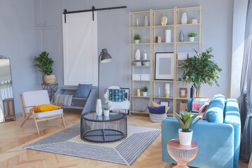elegant creative modern trendy interior of a spacious open plan Scandinavian style studio with seating and sleeping areas
