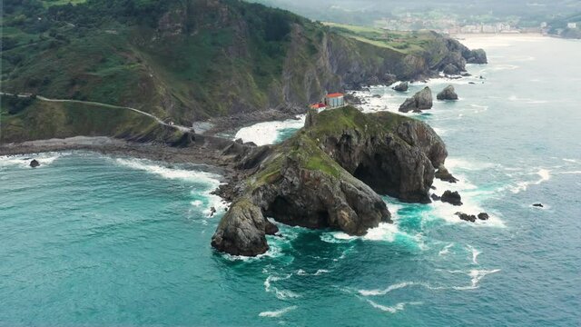 Flight over an amazing Gaztelugatxe island in Spain