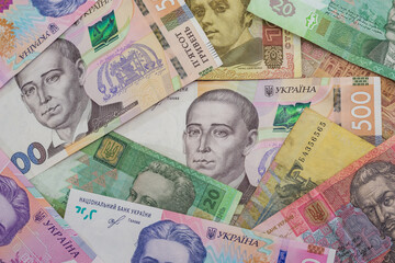 Fototapeta na wymiar Many different hryvnias. Money background.