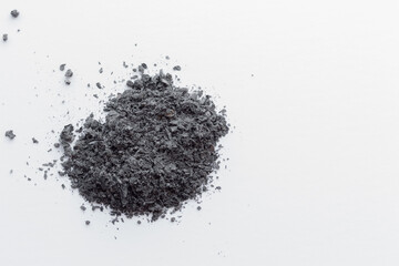 pile of ashes on white background