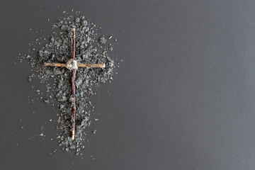 wood cross on ashes - obrazy, fototapety, plakaty