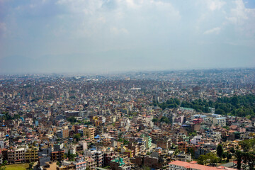 Nepal, Kathmandu,Cityscape seen from the Monkey Temple. Pollution over the citycenter